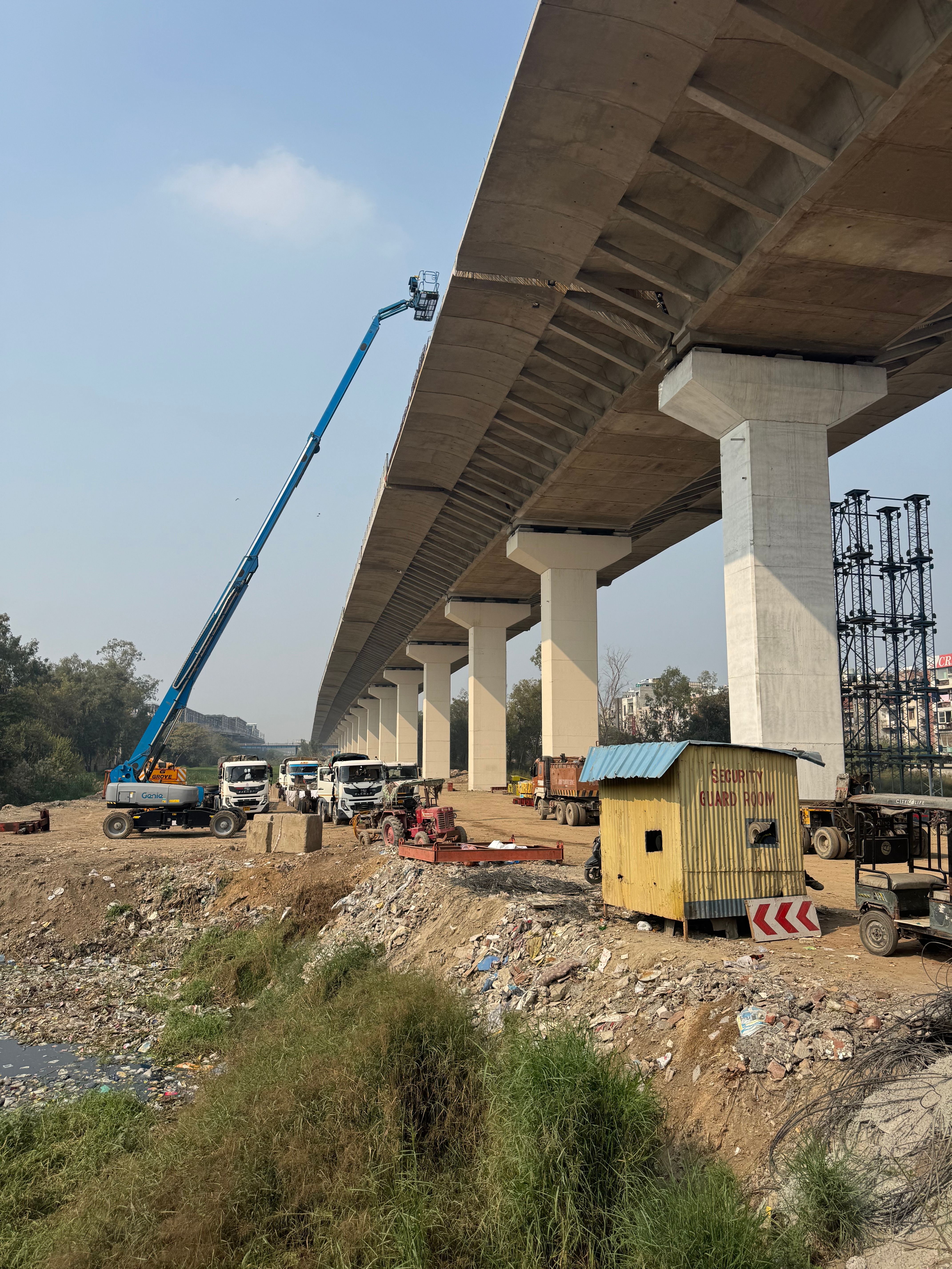 Bridge maintenance work under an elevated bridge structure