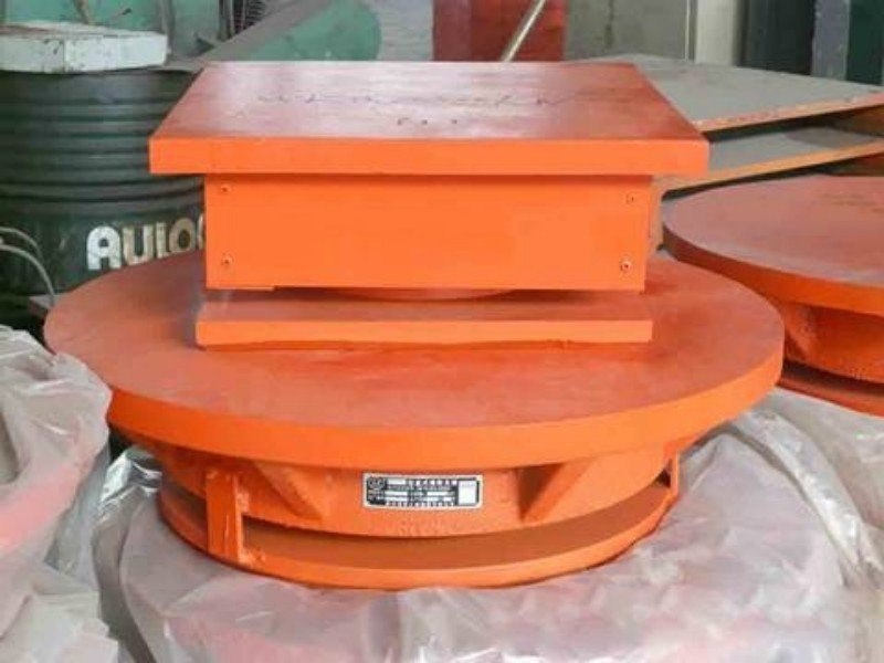 Pot bearing product assembly photographed in a workshop