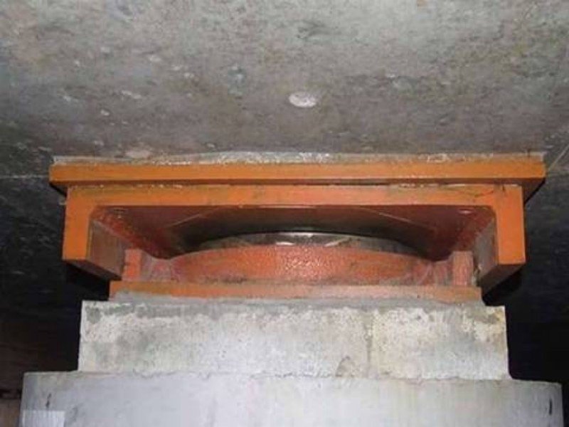 Pot bearing installed under a concrete support